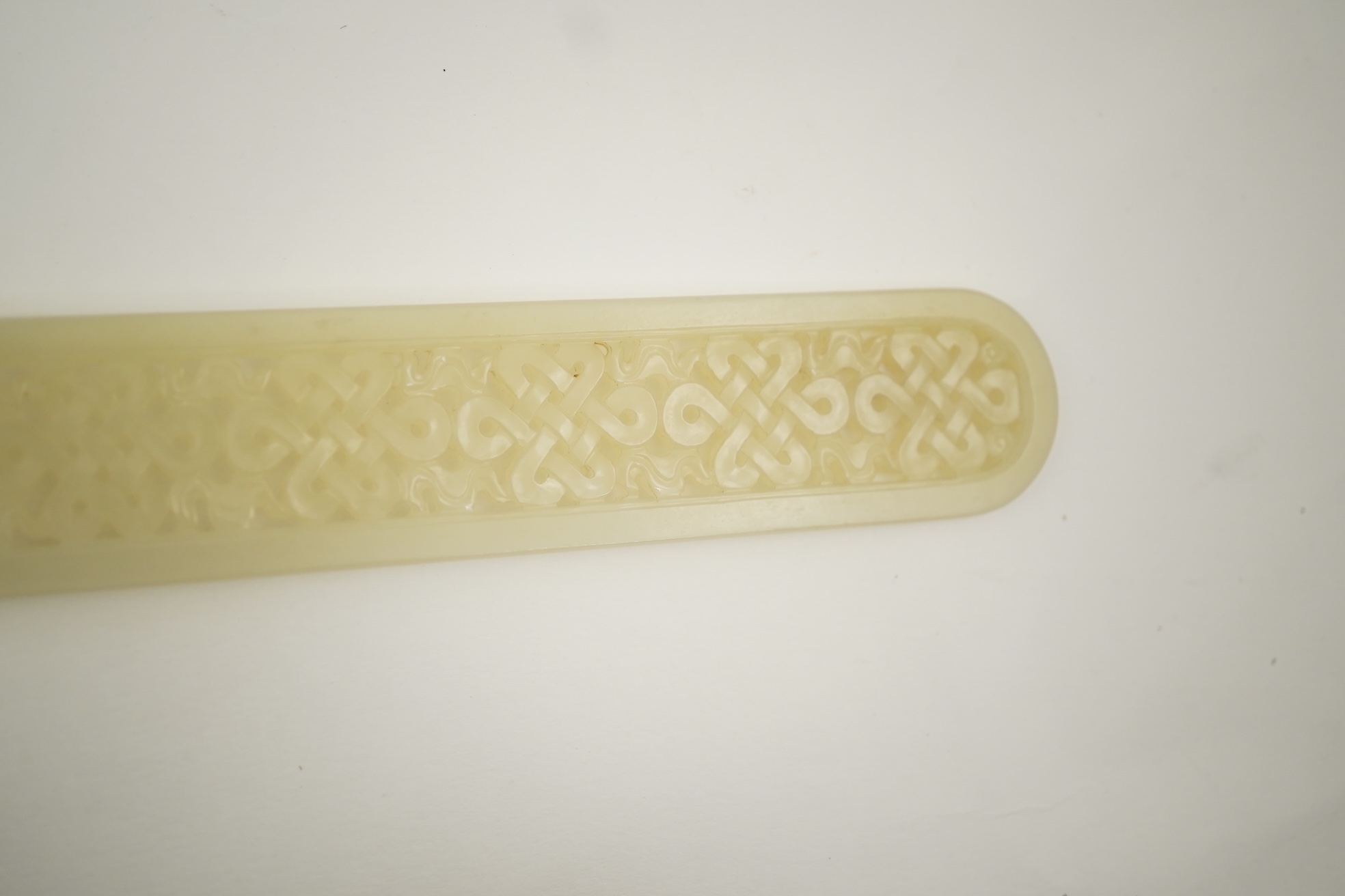 A Chinese pale celadon jade scroll weight